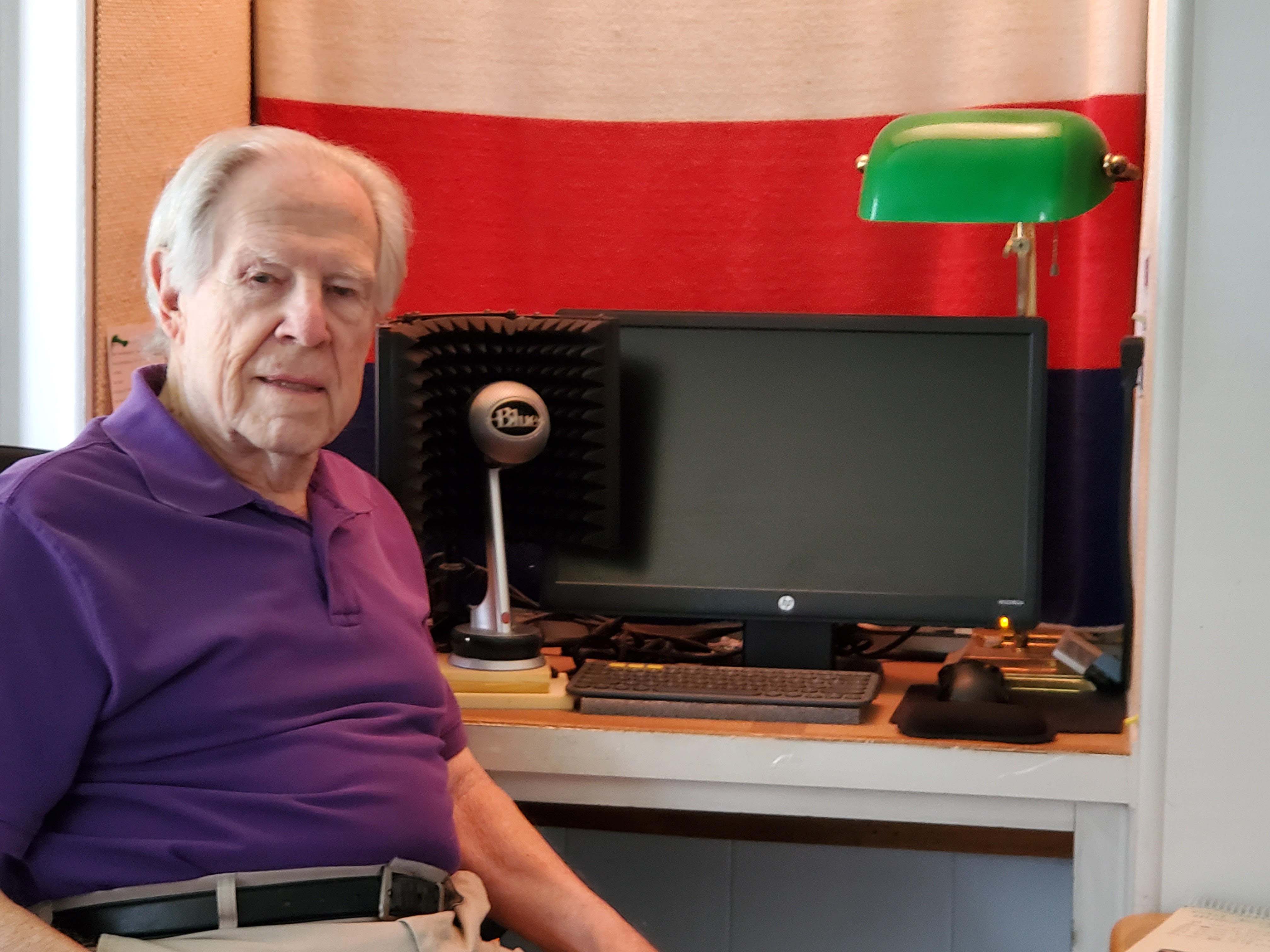Jerry Byrd in his home recording studio, facing the camera. 